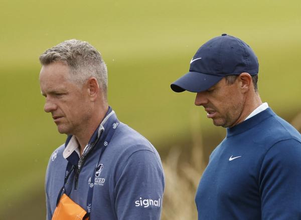 Luke Donald with Rory McIlroy